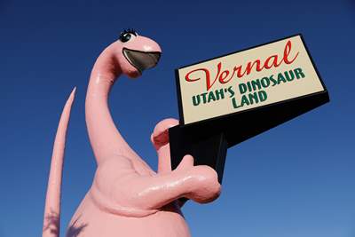 Dinah the Pink Dinosaur, a 40-foot-tall Brontosaurus statue, greets all visitors to Vernal.